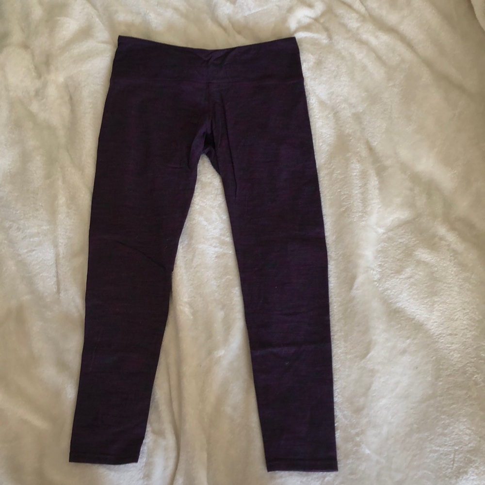 Pink and black striped yoga pants.